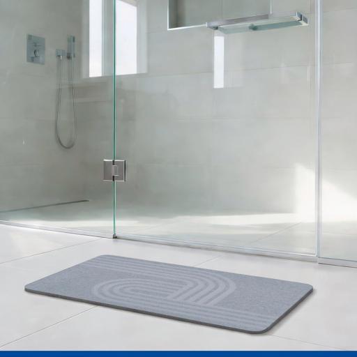 WENKO Alfombra diatomita de baño Mod Manhattan 60x39cm, alfombra de baño de secado rápido, antideslizante, gran capacidad de absorción de agua, alfombra de ducha absorbente, gris [1]