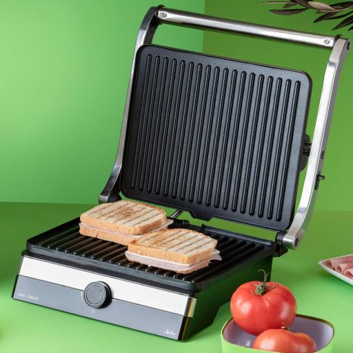  Parrilla Electrica y Grill JATA con placas rayadas antiadherentes de 29 x 23,6 cm. 2000 W. Cocina todo tipo de alimentos. Apertura 180º. Tapa superior basculante. Bandeja recogesalsas [1]