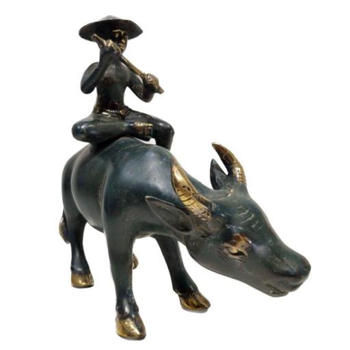 Búfalo y Niño con flauta de bronce [1]
