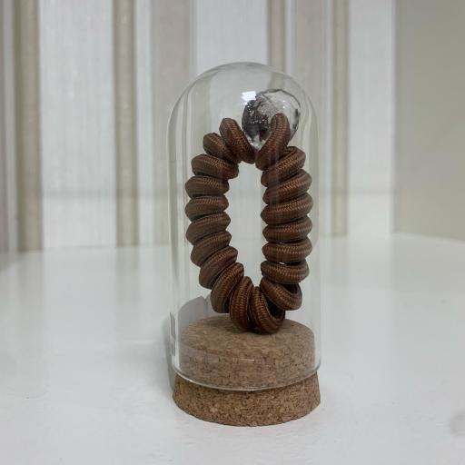 Coletero espiral marrón en minibote de cristal [0]