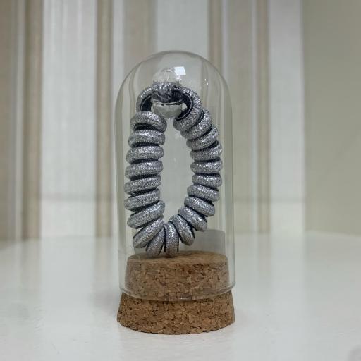 Coletero espiral plata brillo en minibote de cristal