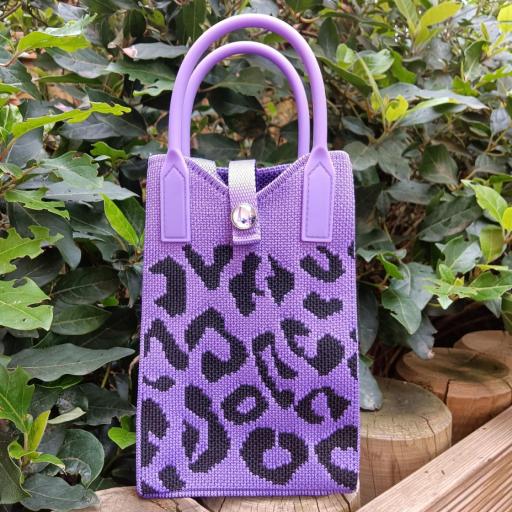 Bolso mini punto animal print morado y negro