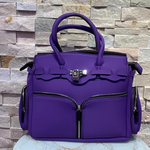 Bolso La Fille des Fleurs maletin morado con asa semirrígida y candado