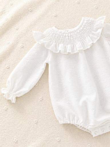 Ranita de lino color blanco. De la talla 3m a 24m.