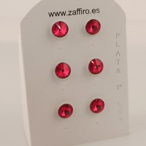 Expositor pendientes plata swarovski components 12 mm. rojos.