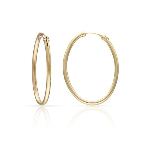 Aros Tubo Oval en Oro 18K – Diseño Contemporáneo con Presencia