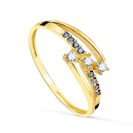 Anillo de oro 18k con circonitas azules y blancas