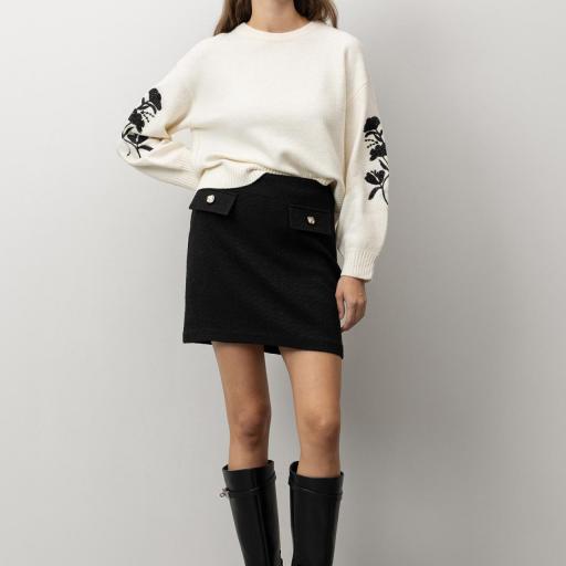 Falda negra con bolsillos
