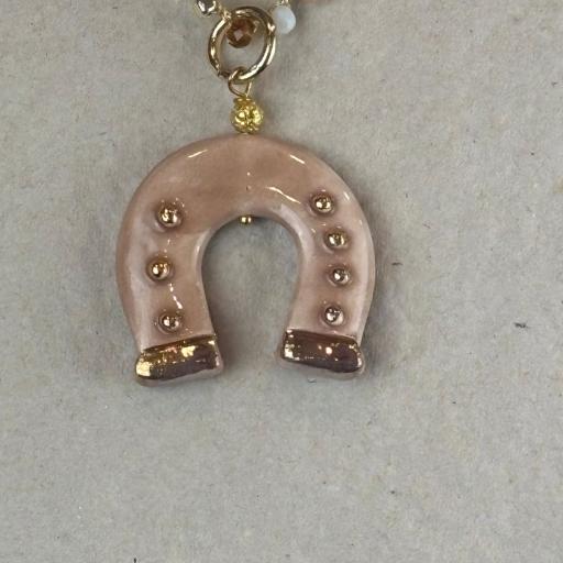 Collar Herradura, Truhanas [3]