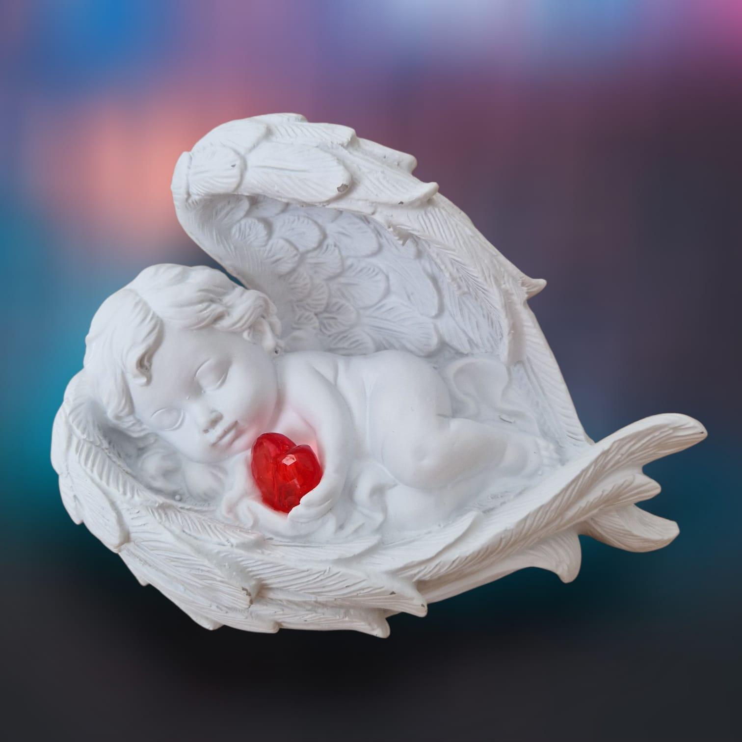 ANGEL TUMBADO CORAZON ROJO (LUZ)