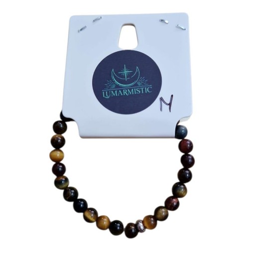 PULSERA DE MINERAL TRES OJOS