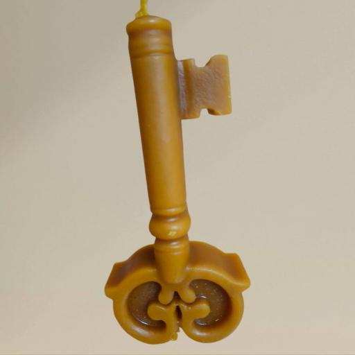 VELA DE MIEL CON FORMA DE LLAVE.