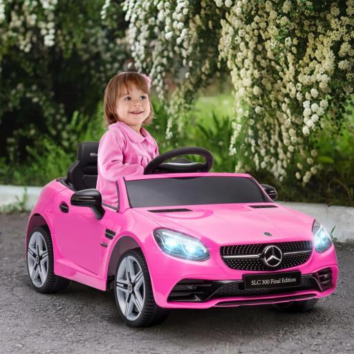 Coche Eléctrico para Niños de +3 Años, Mercedes SLC 300, Coche Eléctrico 12V, con Mando a Distancia 2,4 G, Ruedas Traseras con Suspensión, Faros LED, Música, USB, Motor Doble, Rosa