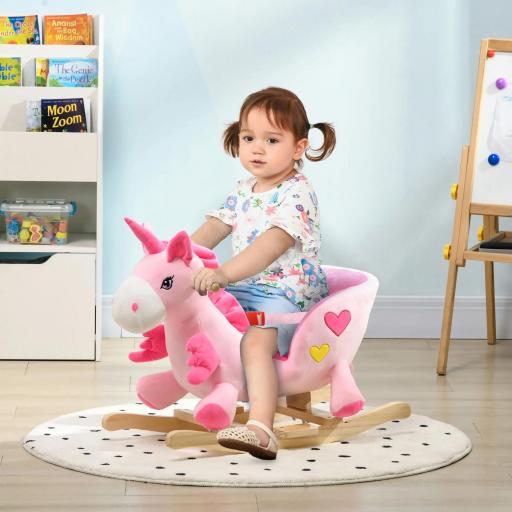 Caballito Balancín Infantil en Forma de Unicornio con Música Cinturón de Seguridad Manillar y Reposapiés 65x35x45cm Rosa