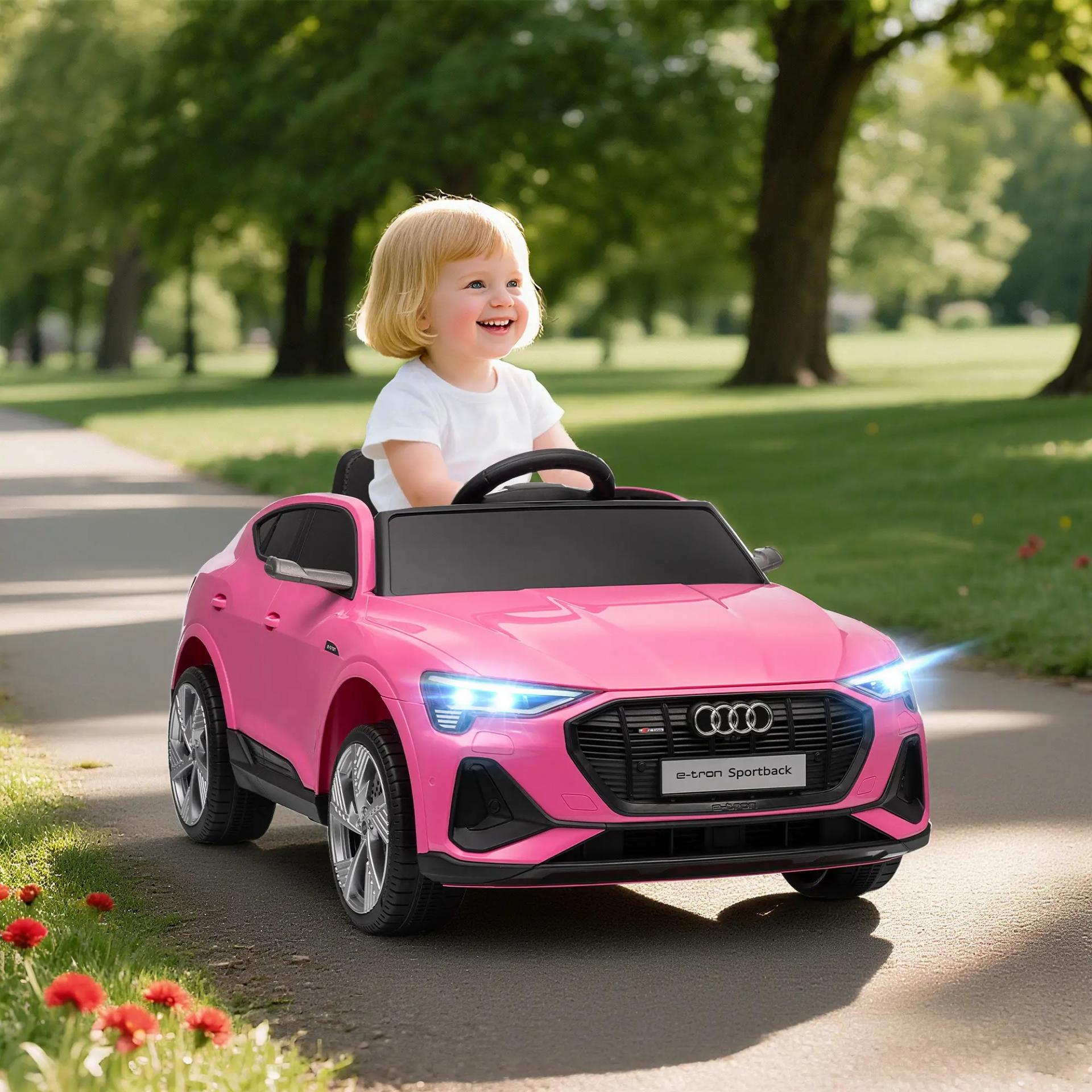 Coche de Batería para Niños 12V Audi E-tron con Mando a Distancia Faros Bocina Música Velocidad 3-5 km/h Rosa