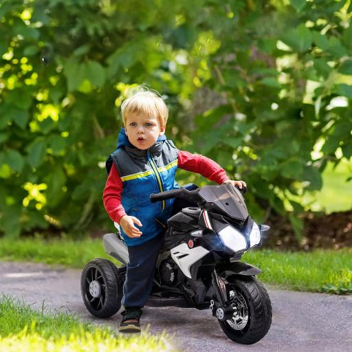 Moto Eléctrica Infantil con 3 Ruedas Trimoto para Niños de +3 Años con Batería 6V Recargable Funciones de Música Bocina Faros 86x42x52 cm Negro y Blanco