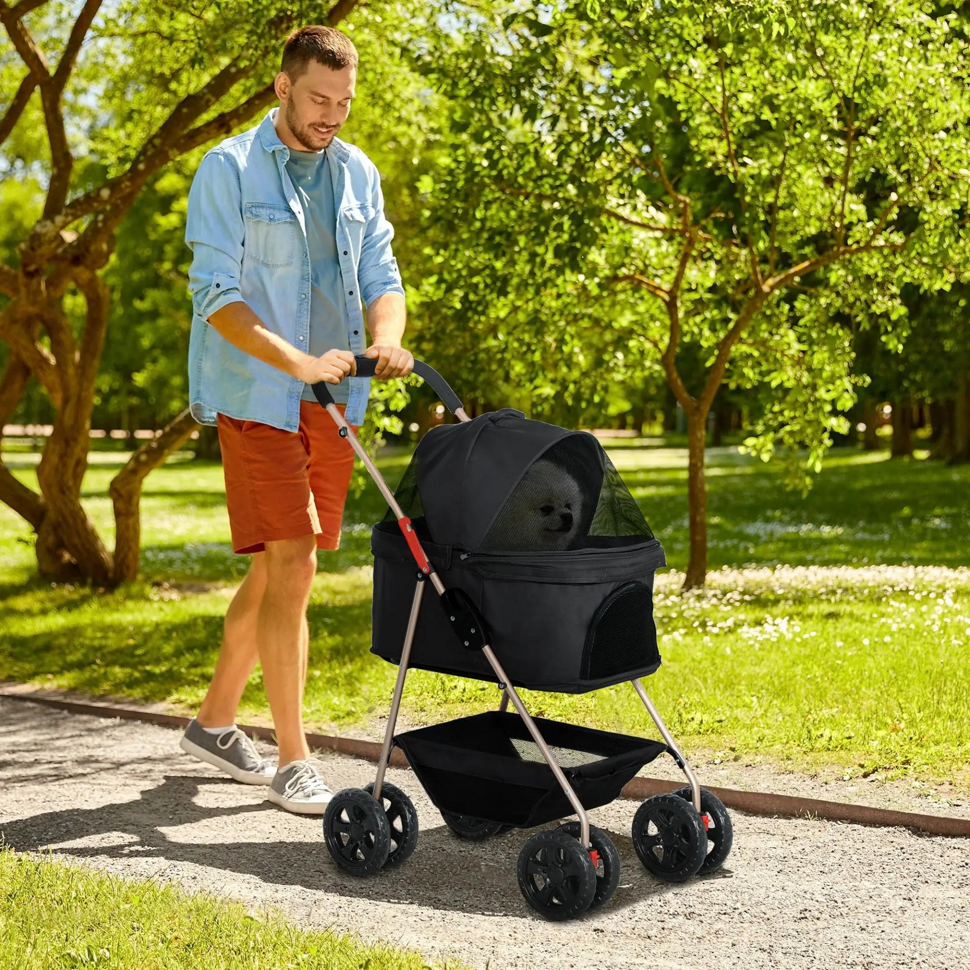 Carrito para Perros Plegable 3 en 1 con Cesta de Almacenaje Ventana de Malla y Sistema de Seguridad 76x50x102 cm Negro