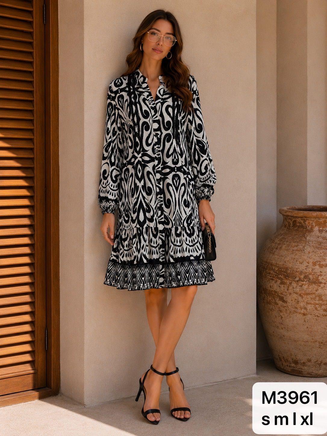 VESTIDO CAMISERO DE CORTE MEDI