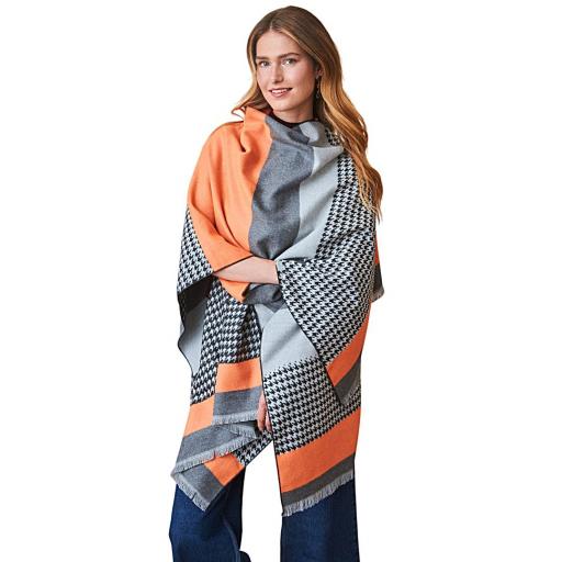 PONCHO REVERSIBLE LATIDO CON CUADROS Y COLOR *